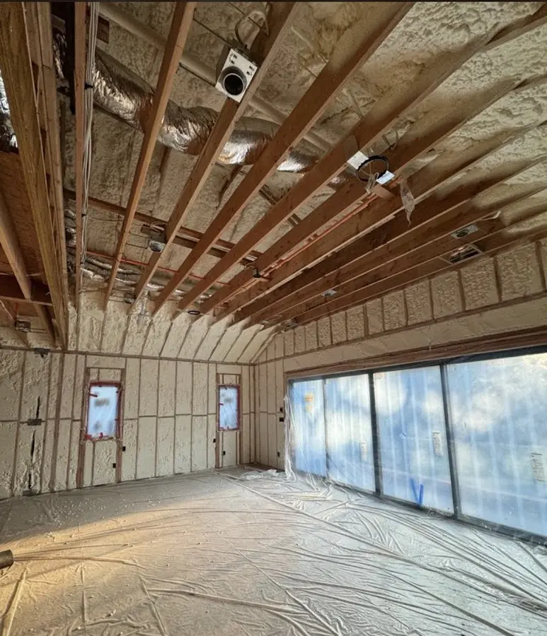 Interior walls and ceiling insulated with spray foam during new construction in Whitpain